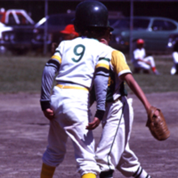1980s youth playing baseball