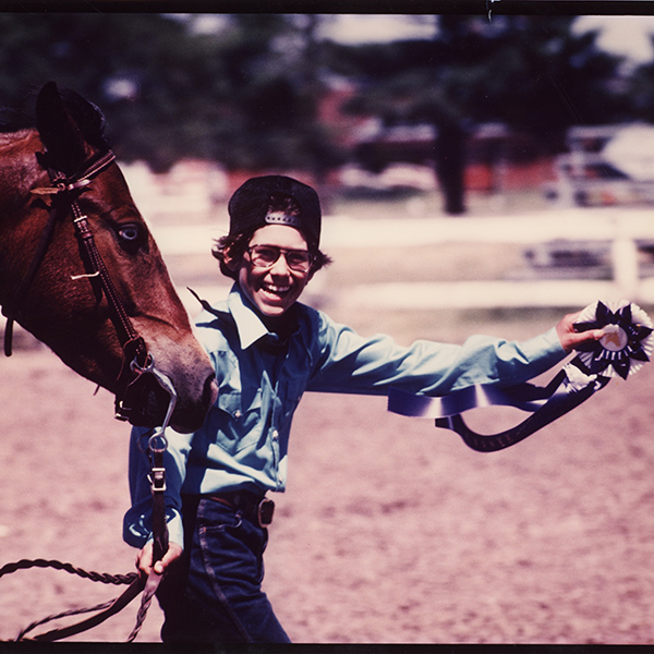 1980s youth with horse and first place ribbon