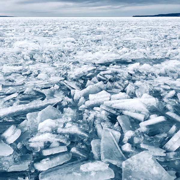 Broken ice floating on Little Travese Bay Michigan